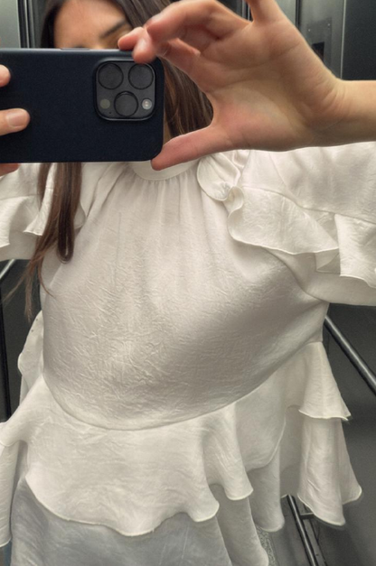 Blouse élégante avec volants