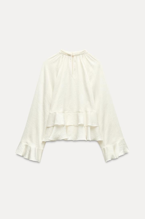 Blouse élégante avec volants