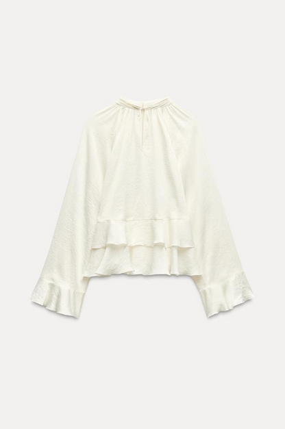 Blouse élégante avec volants